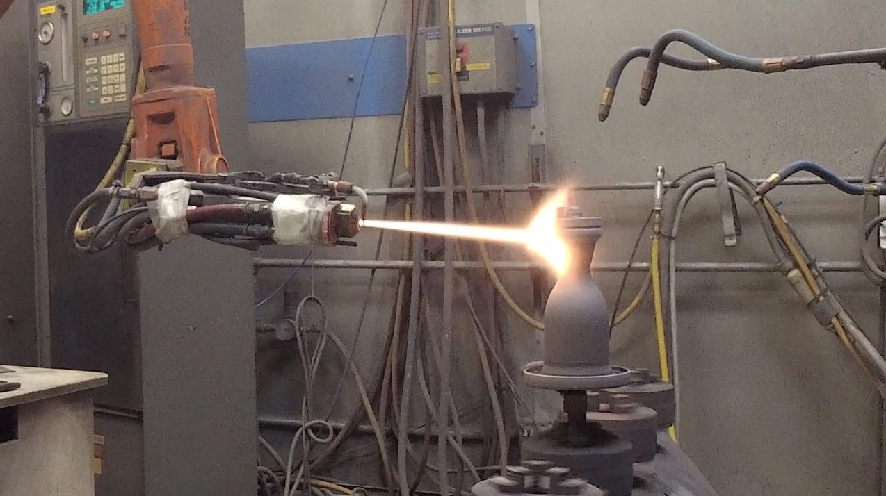 Inconel coating being applied to a 3D printed engine