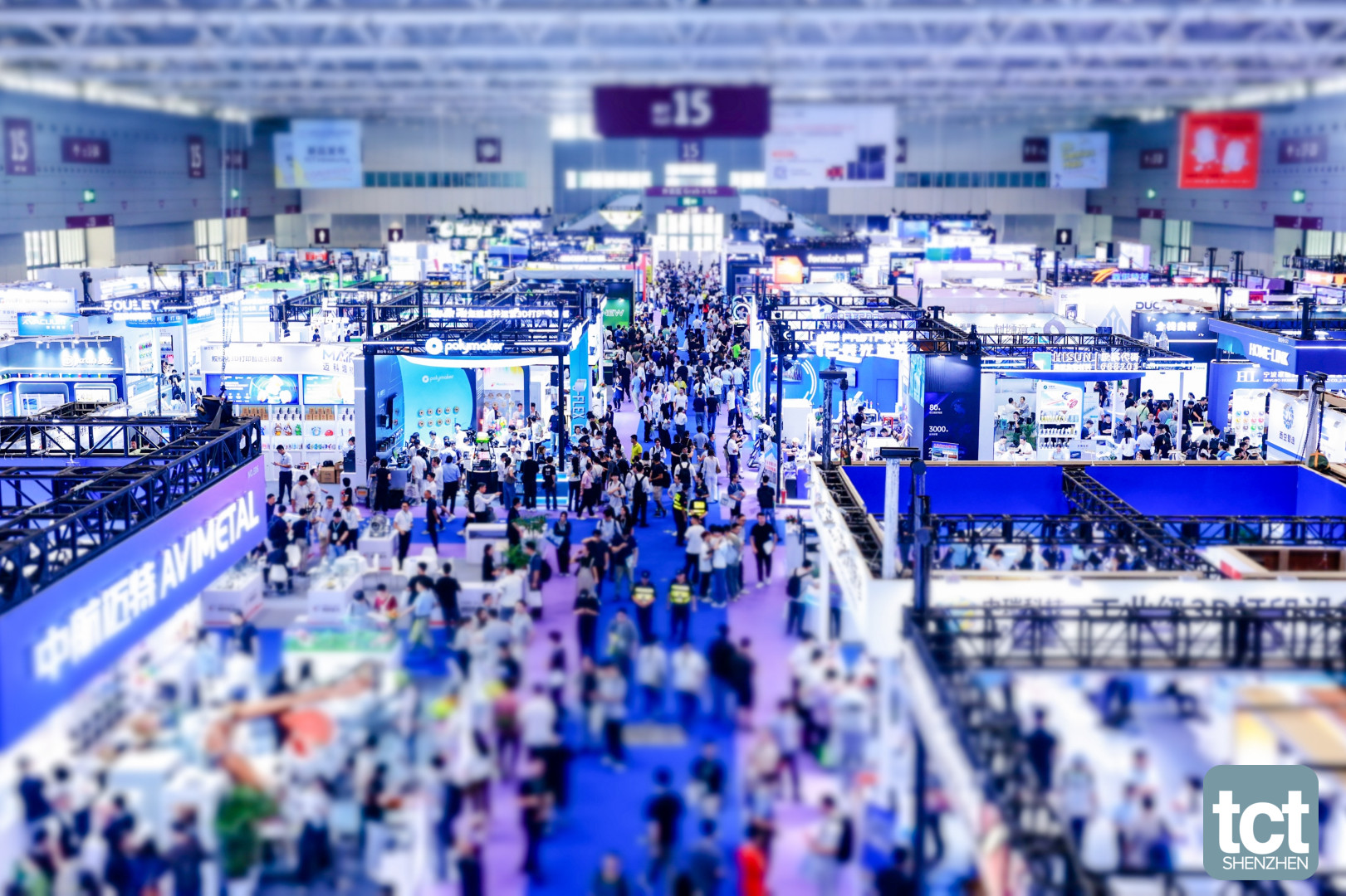 Overhead view of the crowded show floor in Hall 15 at TCT Shenzhen 2026, with Polymaker and Avimetal stands in view