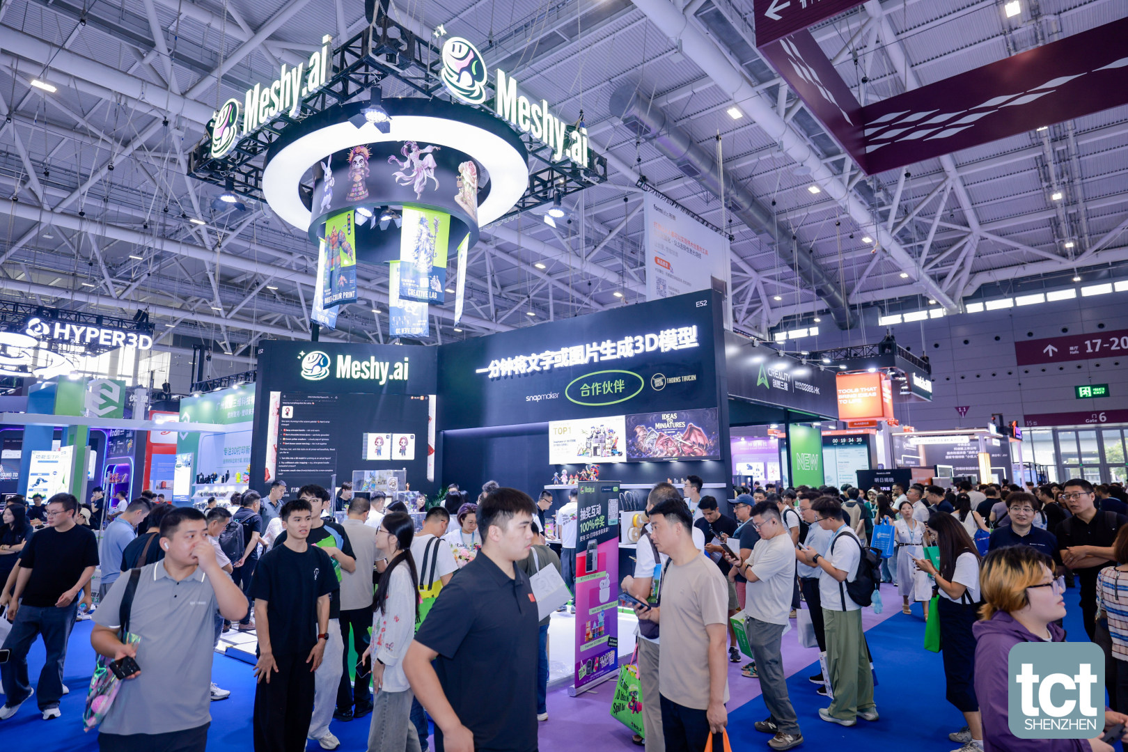 Visitors crowd the Meshy.ai stand at TCT Shenzhen 2026, with the Creality stand behind it
