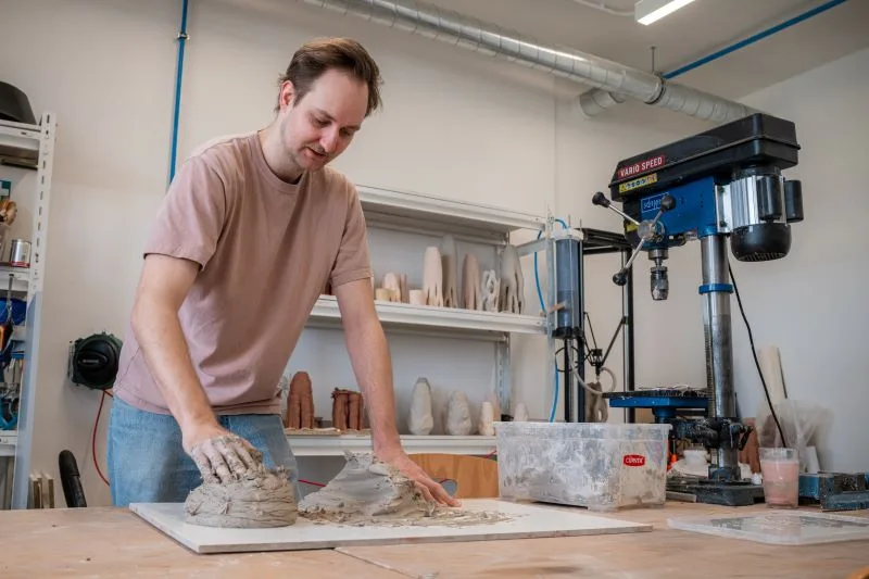 Jan Vítek preparing clay for a ceramic 3D printer