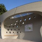 3D Printed Concrete Bus Stop Creates Sculptural Shelter in Slovakia