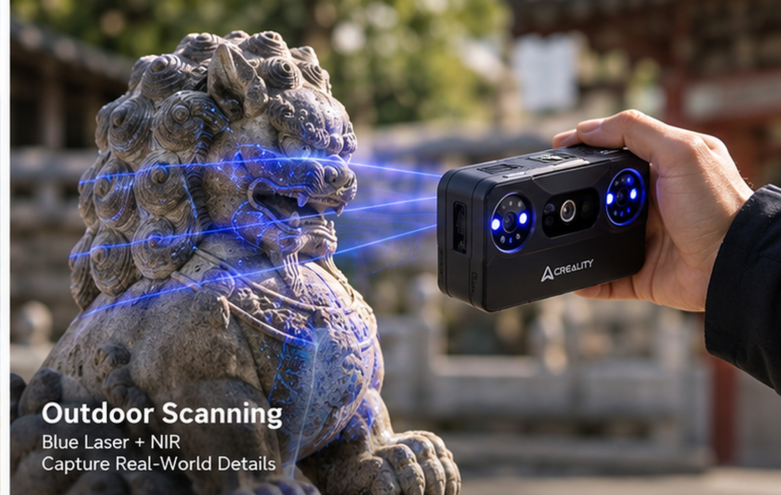 Creality Pika scanning a stone lion statue outdoors with the blue laser lines visible