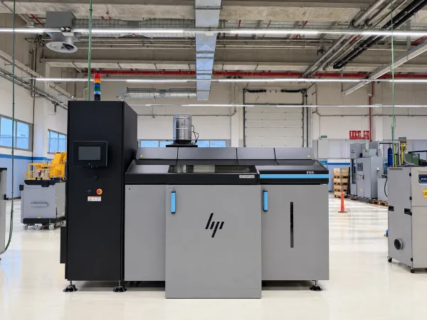 HP Metal Jet S100 binder jet printer on the factory floor at Hyperion in Barcelona