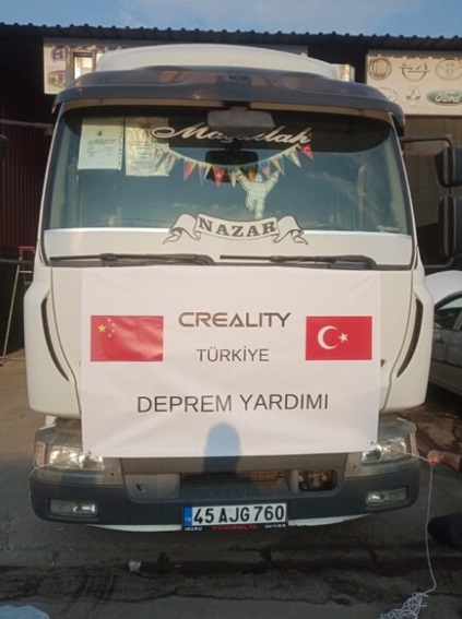 Aid truck carrying relief goods