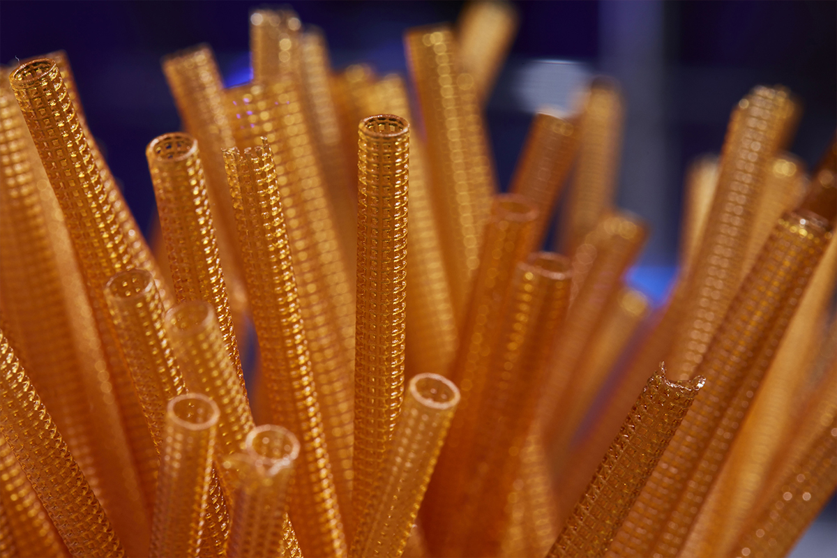 Close-up of amber lattice tubes 3D printed as bioreactor scaffolds
