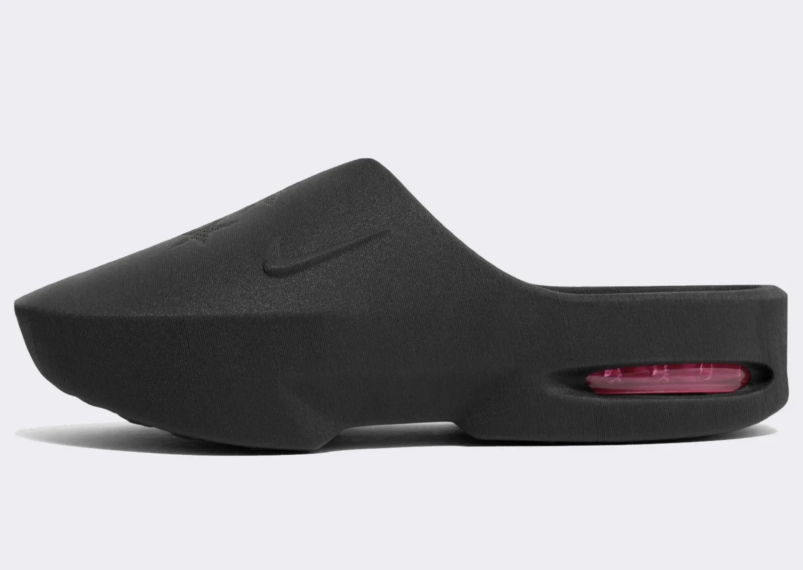 Side view of the black Masyn x Nike Air Works slip-on with a red Air unit