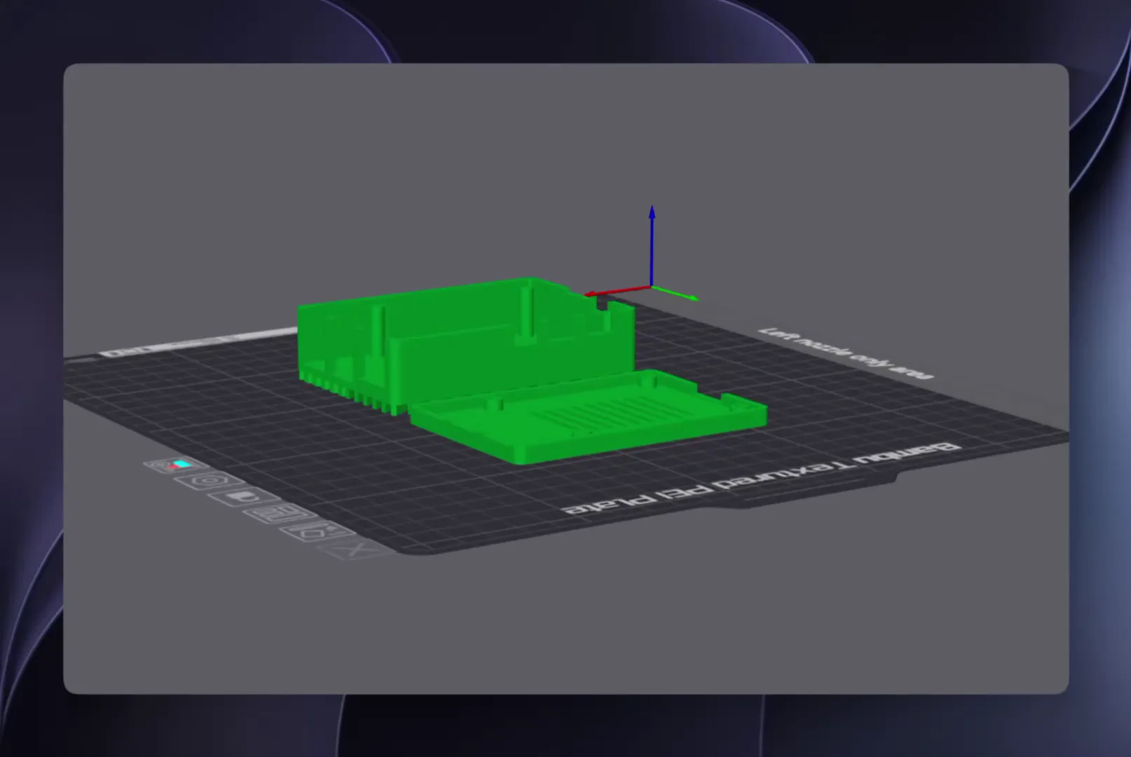 A green two-part Raspberry Pi case on a textured build plate